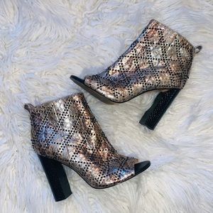Calvin Klein heeled booties faux snake skin